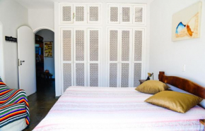 Casa com piscina no Guarujá, condomínio Acapulco
